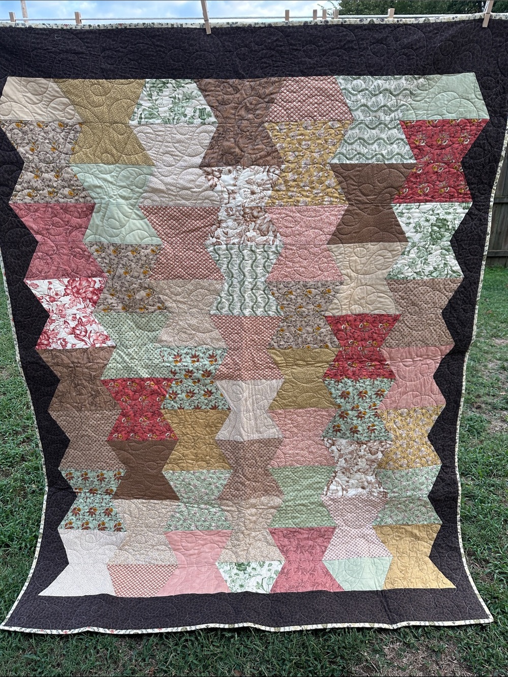 Handmade Hourglass Quilt in Pink, Green & Brown with Dark Border